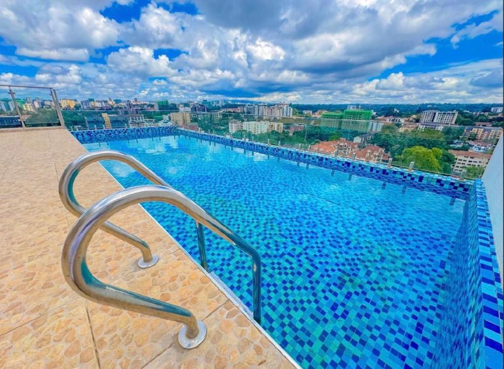 a large swimming pool on top of a building at 2Bedrm apartment in westlands in Nairobi