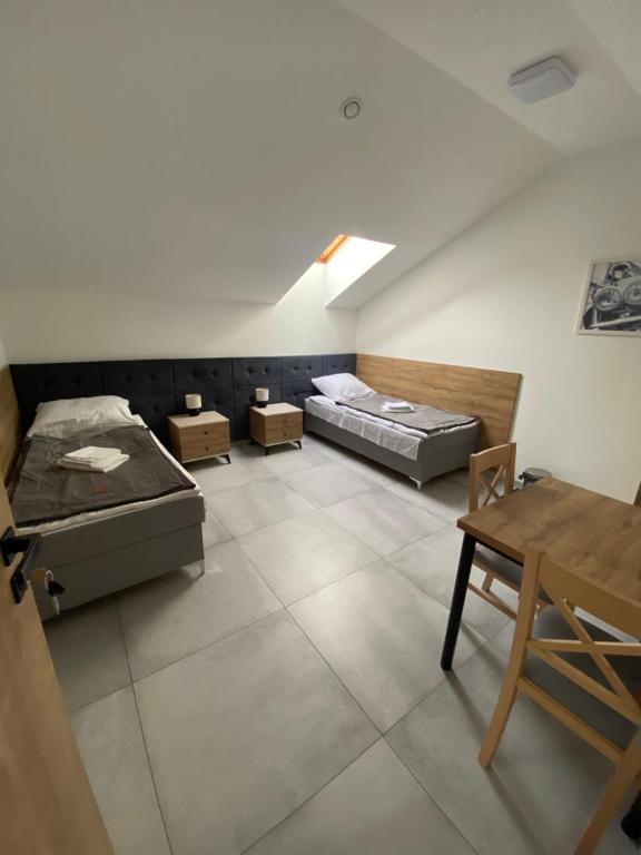 Un lugar para sentarse en Port Jeziorki Pokoje