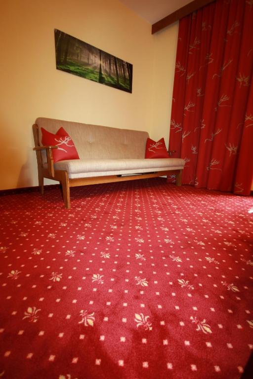 Postel nebo postele na pokoji v ubytování Pension Mühlbachhof