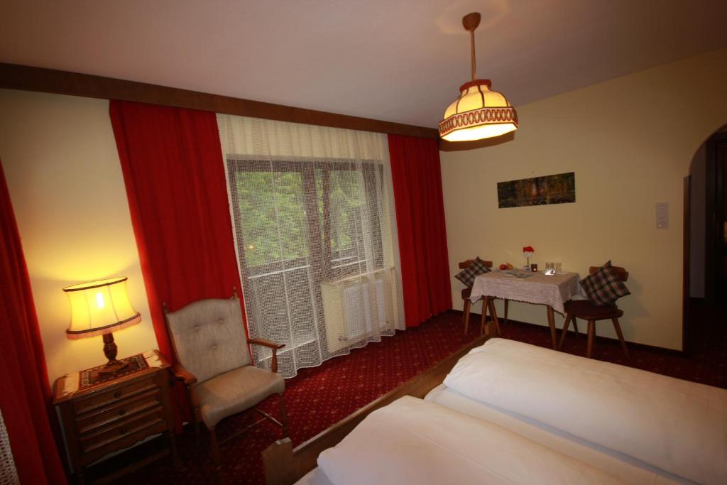 Postel nebo postele na pokoji v ubytování Pension Mühlbachhof