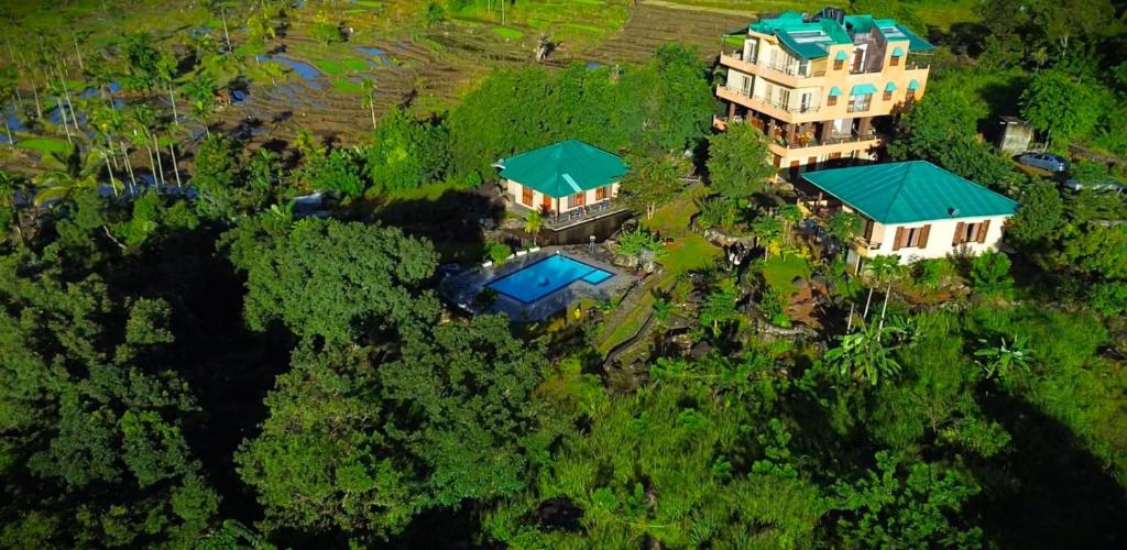 an aerial view of a house in the forest at World's End Base Eco-Village in Belihul Oya