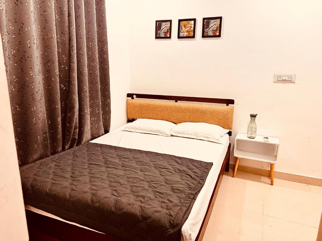 Ένα ή περισσότερα κρεβάτια σε δωμάτιο στο Vibes stay in