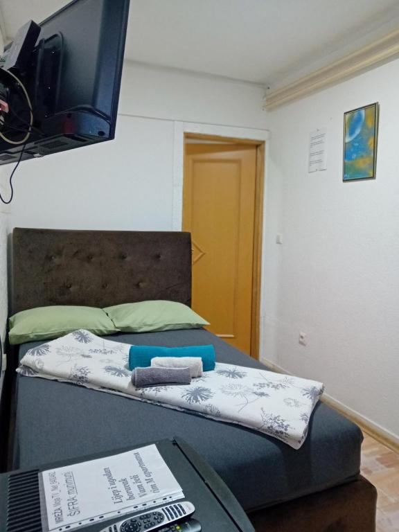 TV a/nebo společenská místnost v ubytování EM Apartments Korzo