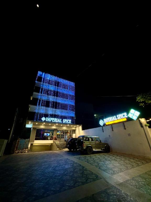 a building with a car parked in front of it at OCEAN PEARL in Visakhapatnam