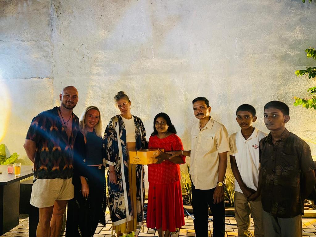 a group of people posing for a picture at Zinera Homestay Ahangama in Ahangama