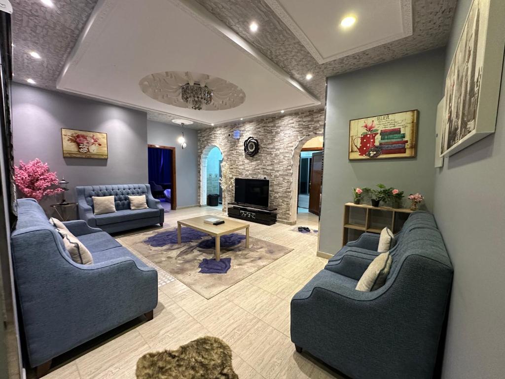 Χώρος καθιστικού στο شقق في بلجرشي