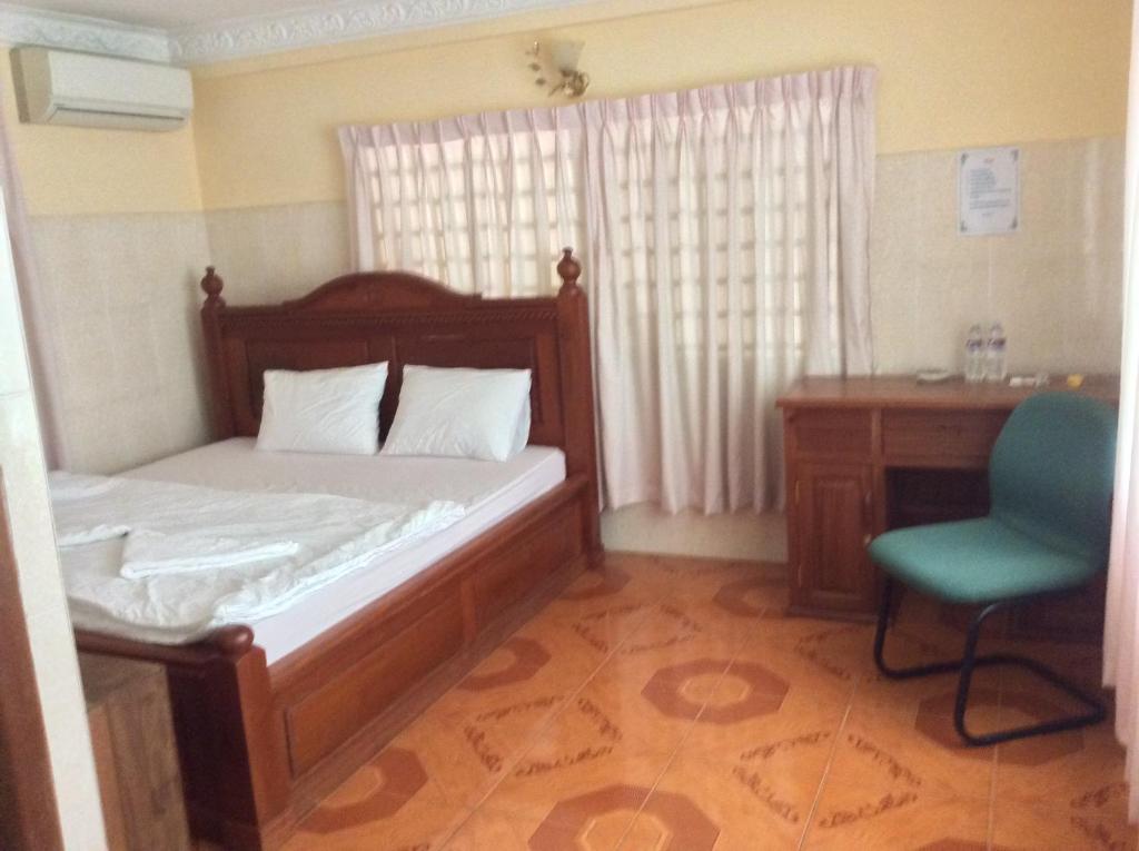 Postel nebo postele na pokoji v ubytování 139 Guest House