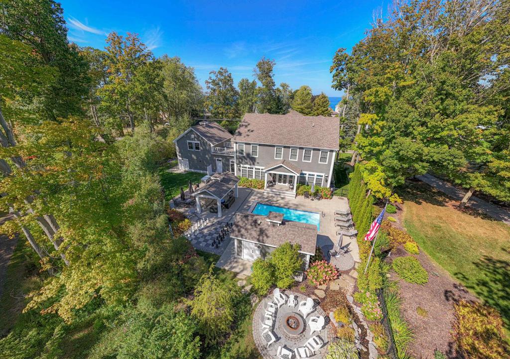 an overhead view of a house with a swimming pool at Lamb Haven in South Haven