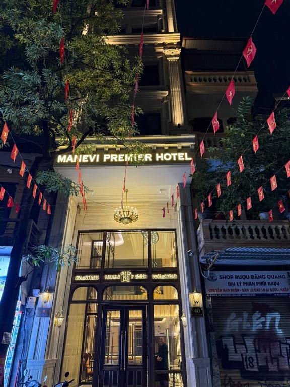 a building with a sign that reads mayhew premier hotel at Manevi Premier Hotel in Hanoi