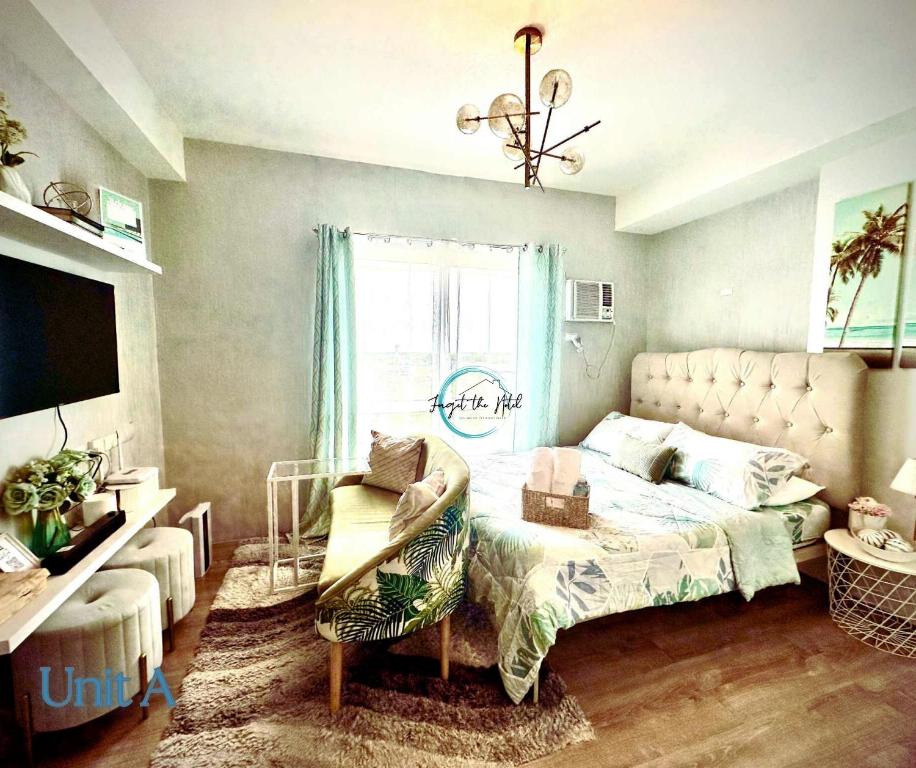 Μια τηλεόραση ή/και κέντρο ψυχαγωγίας στο Lovely Studio Condominiums at Mesavirre Garden Residences Bacolod