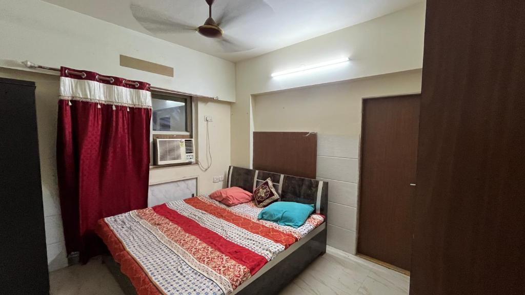 Ένα ή περισσότερα κρεβάτια σε δωμάτιο στο Live with full Pace and Enjoy