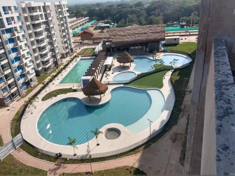 an overhead view of a swimming pool at a resort at Delicados Pastos in Ricaurte