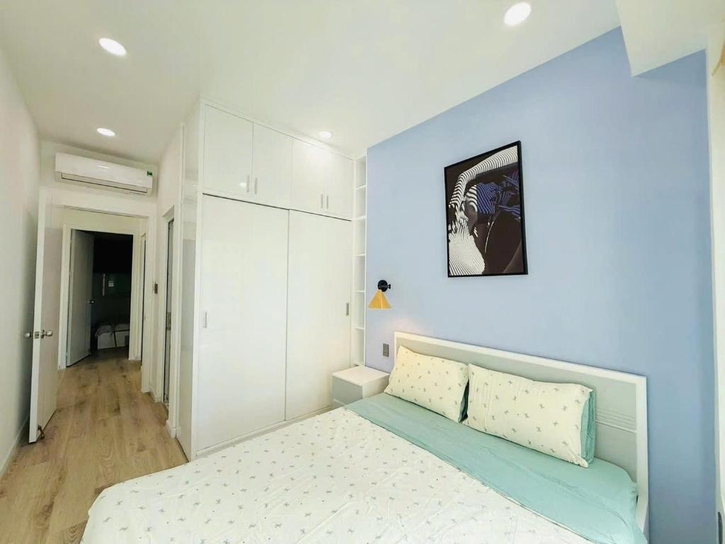 Ένα ή περισσότερα κρεβάτια σε δωμάτιο στο The Wave House Nha Trang