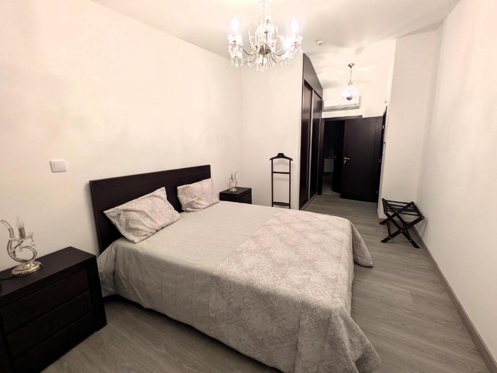 Ένα ή περισσότερα κρεβάτια σε δωμάτιο στο Casa do Margalho