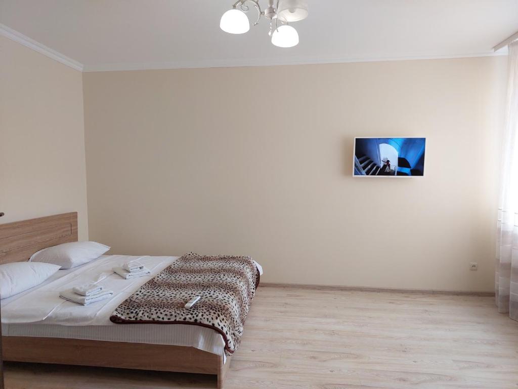 Postel nebo postele na pokoji v ubytování ЖК Центральний біля Авангарду