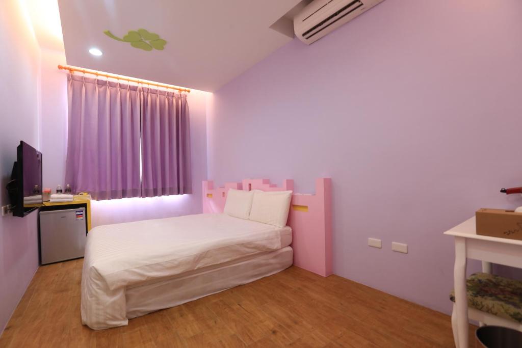 Postel nebo postele na pokoji v ubytování Happy B&B