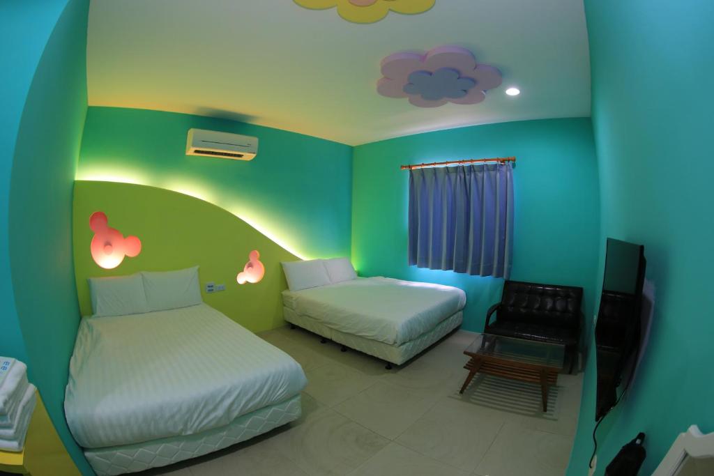 Postel nebo postele na pokoji v ubytování Happy B&B