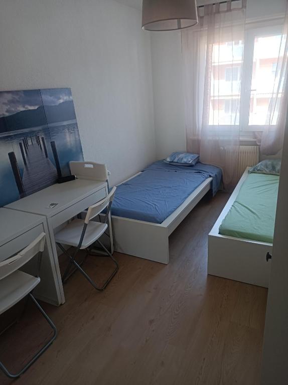 Postel nebo postele na pokoji v ubytování Le petit coin valaisan