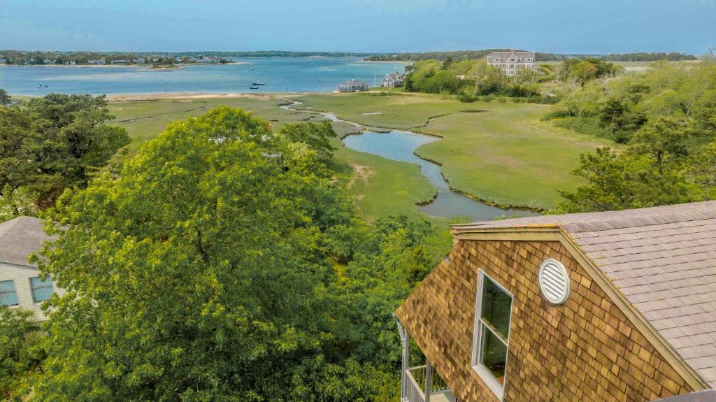 an aerial view of a river and a building at Sweeping Views Minutes to Beach in Chatham