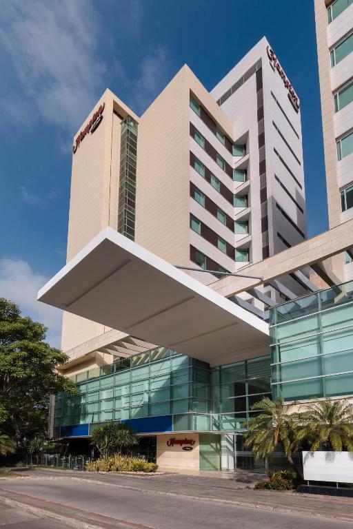 an office building with a large building at Hampton by Hilton Barranquilla in Barranquilla