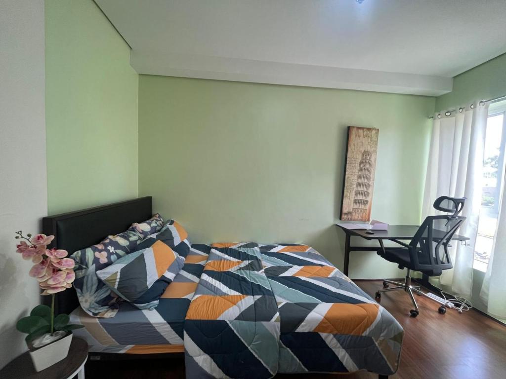 Una cama o camas en una habitación de Sitio Uno Residences - Pueblo de Panay - F&M Homes
