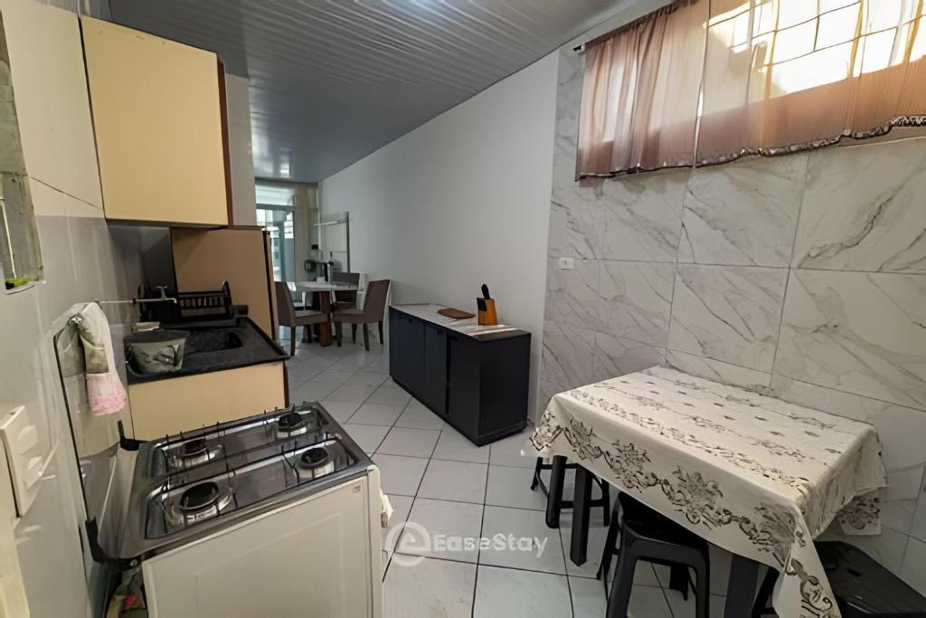 Η κουζίνα ή μικρή κουζίνα στο Pé na areia! Dois minutos de a pé