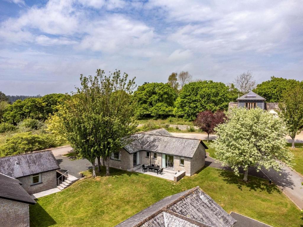 an aerial view of a house with a yard at 2 Bed in St. Mellion 87710 in St Mellion