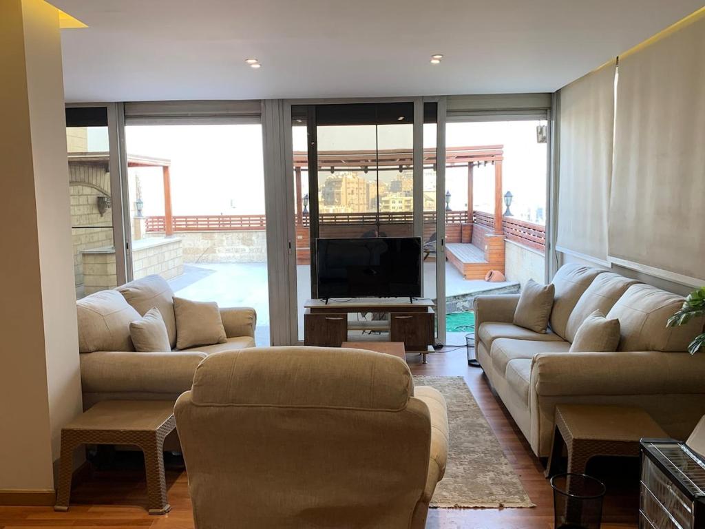 Rouf Al-Mohandessin Apartment, Lebanon Street, Kairo (nove cijene za 2026.)