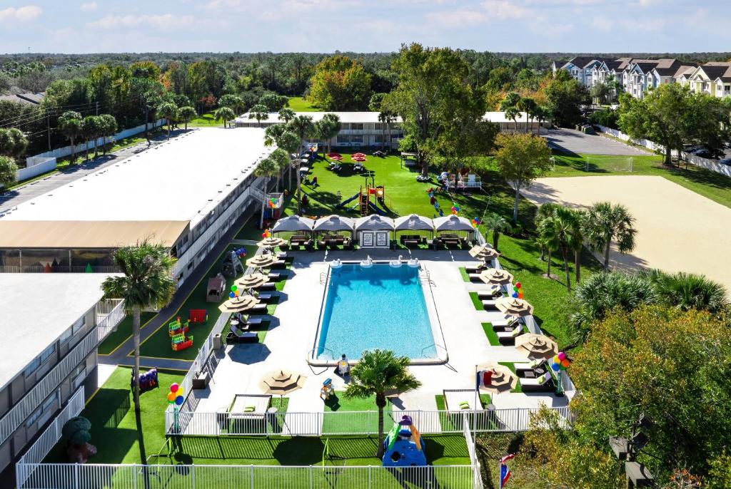 an overhead view of a pool at a resort at Magic Moment Resort & Kids Club, Dazzler Select by Wyndham in Kissimmee