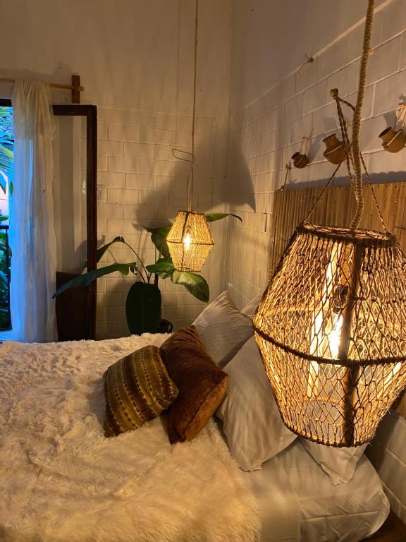 A bed or beds in a room at Casa Yohual