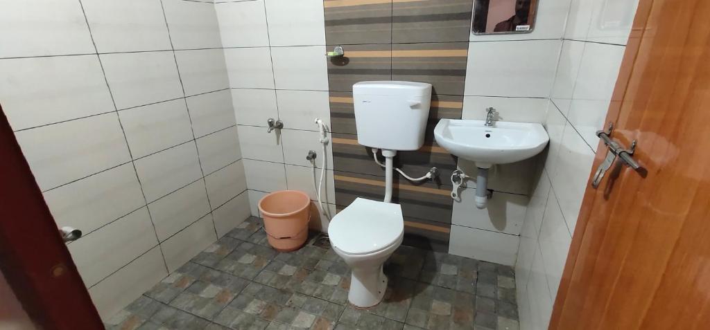 Ένα μπάνιο στο Nanavu Farmhouse