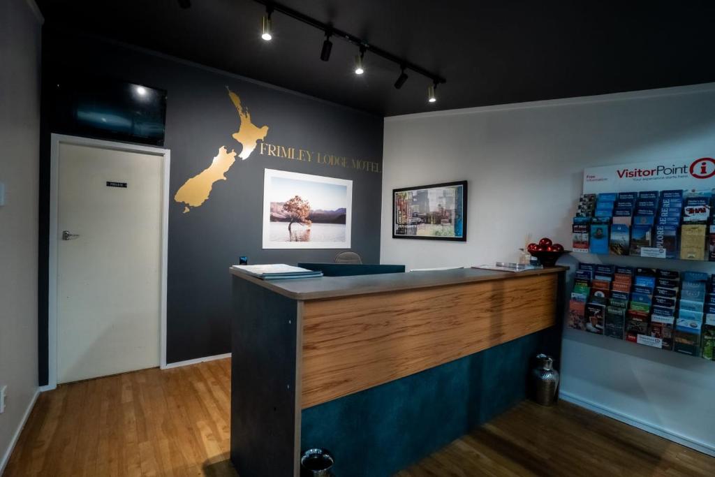 a pharmacy with a counter in a store at Frimley Lodge Motel - with Airport Shuttle service- Best Location in Town in Hastings