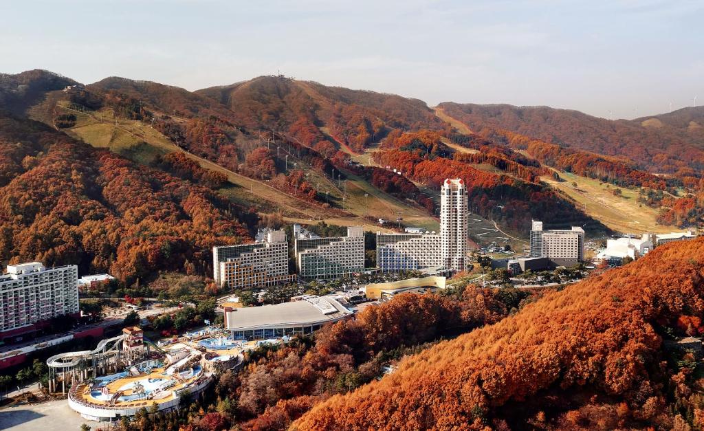 an aerial view of a city with a mountain at Phoenix Resort Pyeongchang in Pyeongchang 