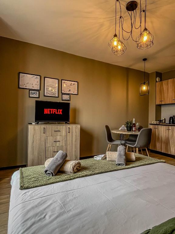 Postel nebo postele na pokoji v ubytování Tarein Studio