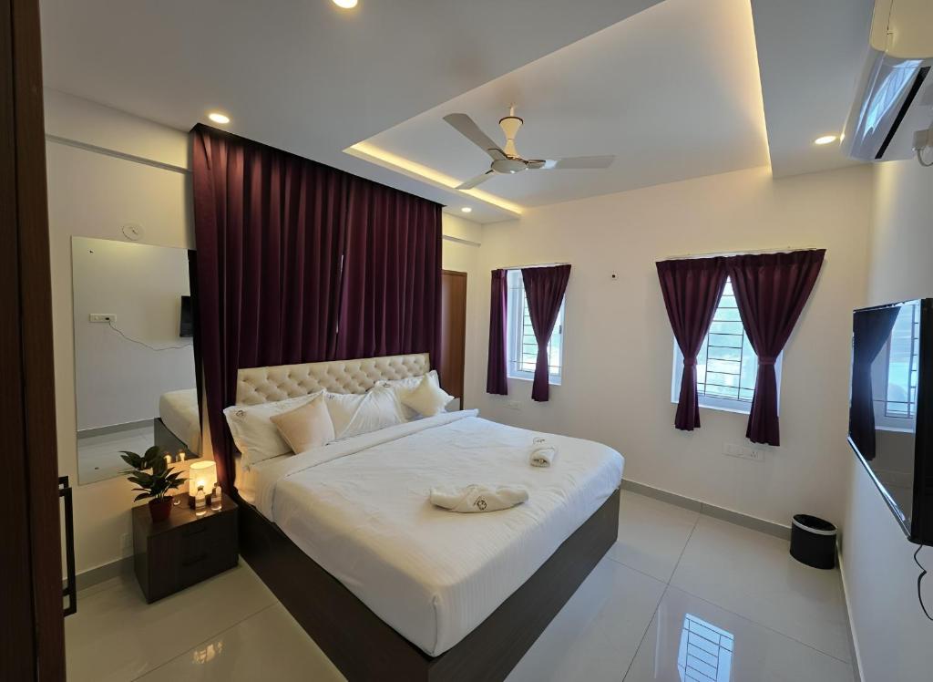 Ένα ή περισσότερα κρεβάτια σε δωμάτιο στο Broadway Inn