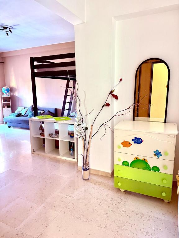 a bedroom with a bed and a vase with a plant at Stura Home in Rome