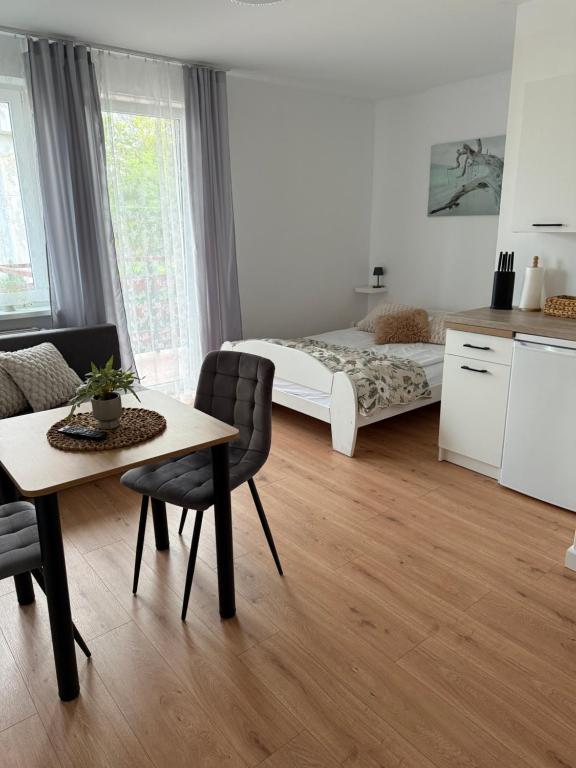 Ένα ή περισσότερα κρεβάτια σε δωμάτιο στο Dom Gościnny Ania