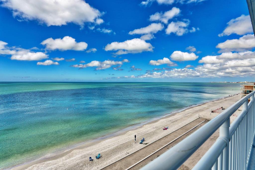 a view of the beach from a balcony at Sunset Chateau 506 - Premier in St. Pete Beach