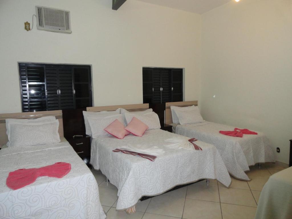 Postel nebo postele na pokoji v ubytování Hotel Royal Class