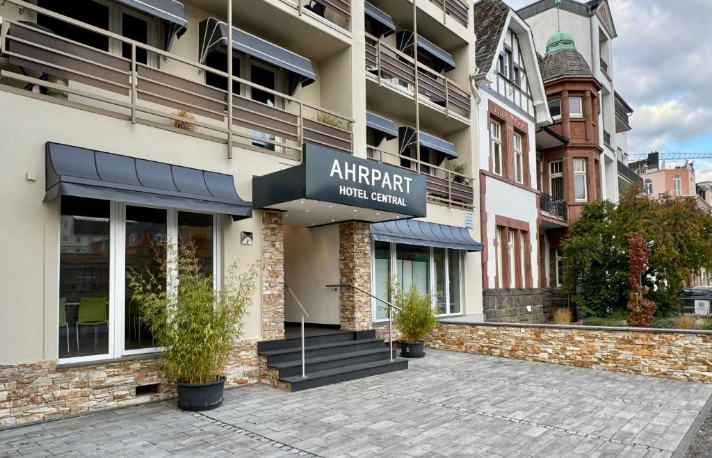 an apartment building with a sign that reads airport hotel center at AhrPart Hotel Central in Bad Neuenahr-Ahrweiler