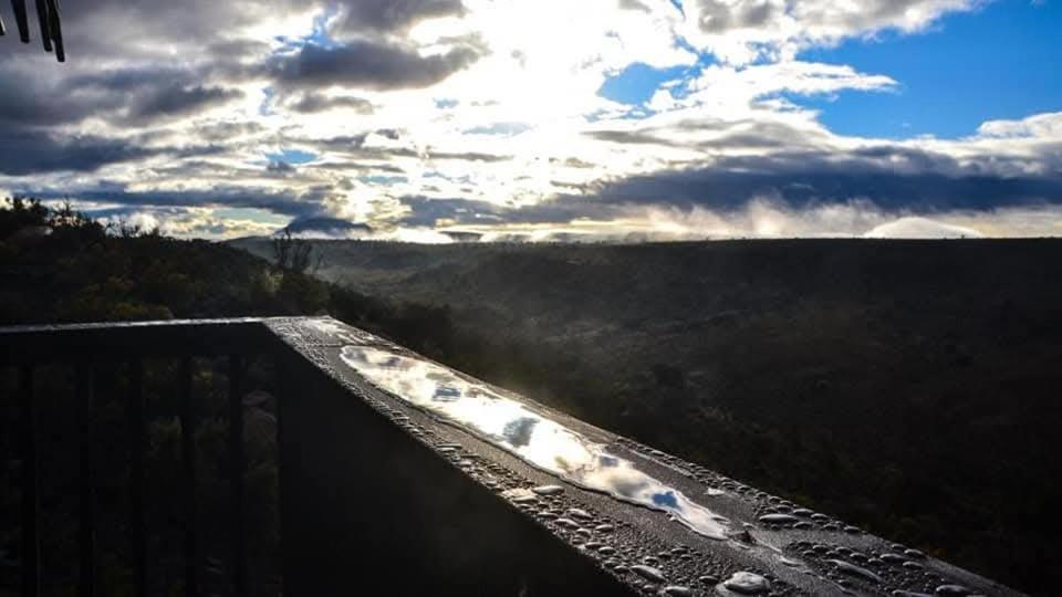 a view from the top of a mountain with the sky at Zandfontein Bush Camp and Game Farm in Platdrift