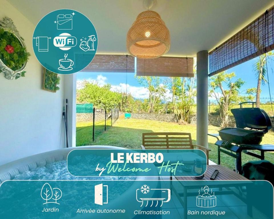 a hot tub in a room with a view of a yard at Le Kerbo, Calme & Jacuzzi privé à Bras-Panon in Bras-Panon