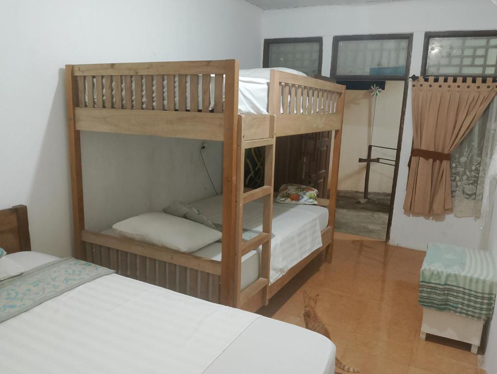 Postel nebo postele na pokoji v ubytování fullesguesthouse