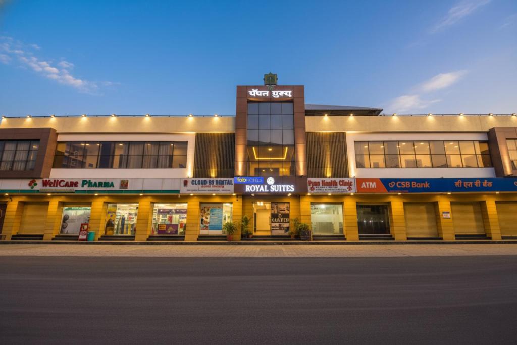 a building with a street in front of it at FabHotel Royal Suits - Nr Mahadji Shinde Chhatri in Pune