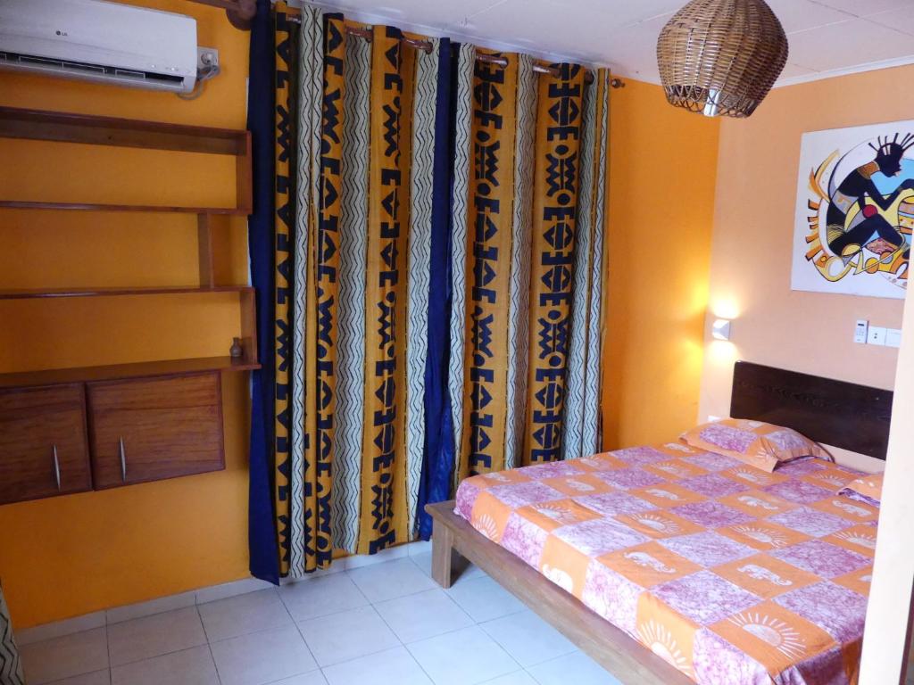 Postel nebo postele na pokoji v ubytování Villa Charlestine