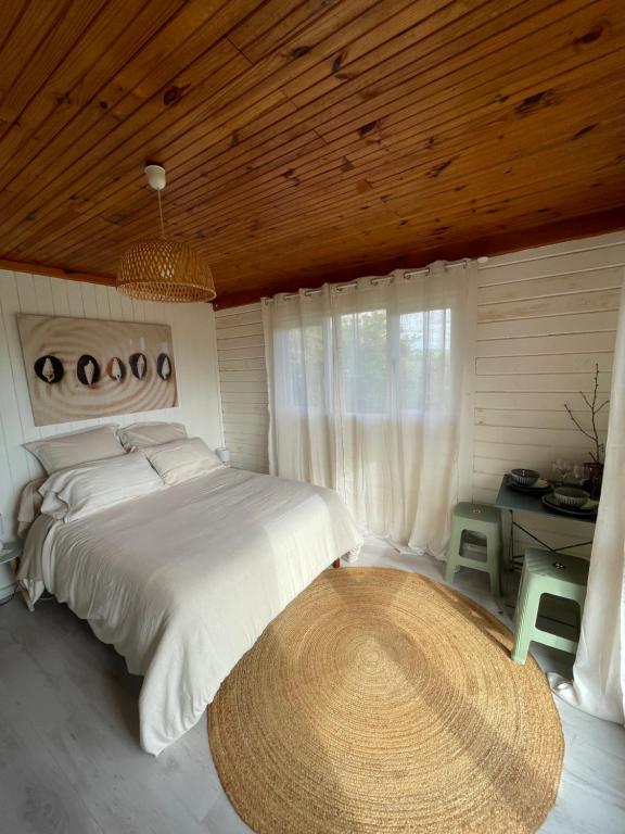 Postel nebo postele na pokoji v ubytování Le Lodge BelAir