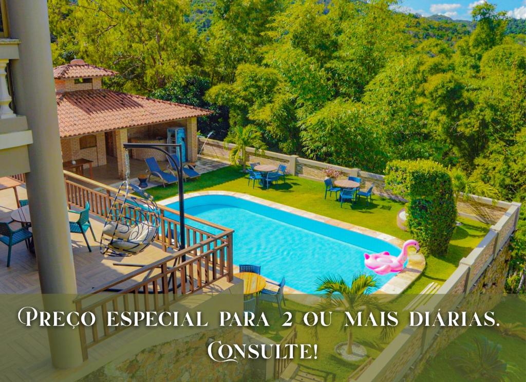 an image of a swimming pool in a house at Le Rêve Pousada e Restaurante in Guaramiranga
