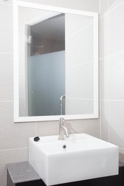 Koupelna v ubytování Qlassic Hotel