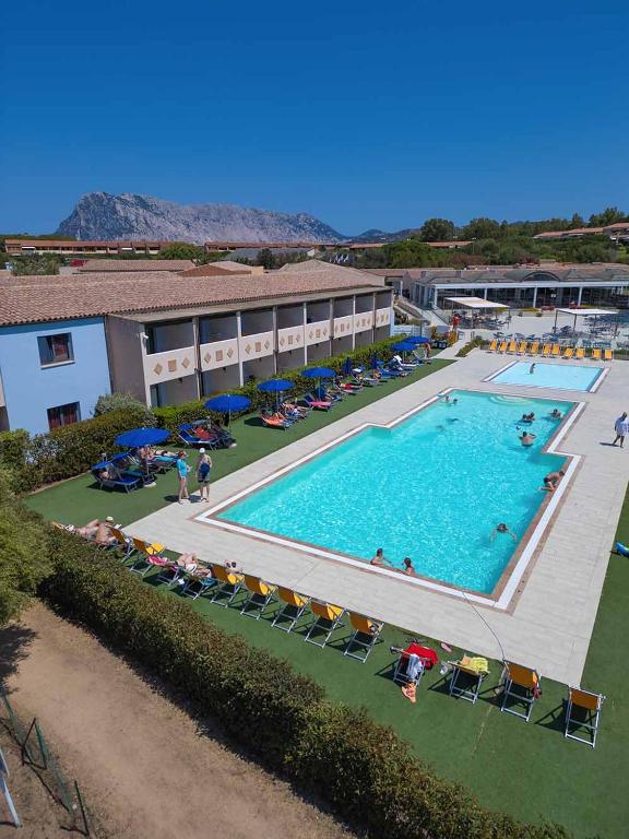 an overhead view of a swimming pool in a hotel at Hotel Baja Bianca in San Teodoro