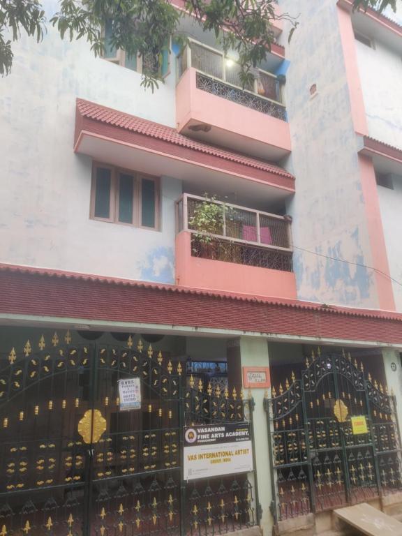 a building with a gate in front of it at The Ultimate stay in Puducherry